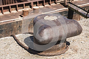 Old metal dock mooring pole