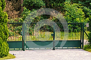 Old metal entrance gate to private property.