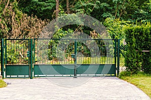 Old metal entrance gate to private property.