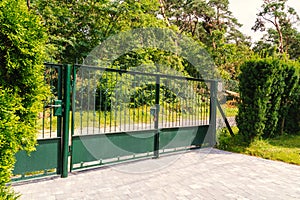 Old metal entrance gate to private property.