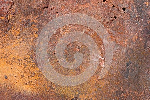 Old metal exfoliating sheet with red and yellow rust, texture