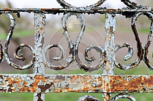Old metal fence close-up perspective background. Geometrical pat