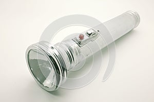 Old metal flashlight, silver torch