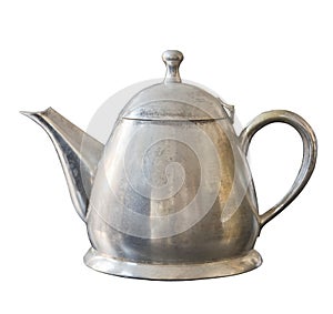 Old metal kettle isolated on white background. Vintage shabby dishes