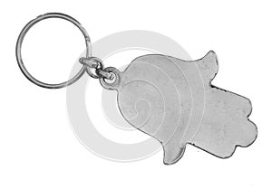 Old metal keyring. Hand of Fatima. Isolated on white background.