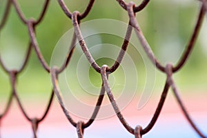 Old metal mesh wire fence