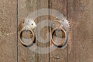 Old metal padlock on a wooden door. Historical village Bojenci, Gabrovo, Bulgaria