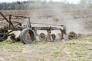 Old metal plow in farming event