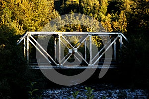 Old, metal railway bridge in the nature