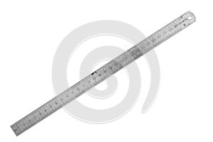 Old metal ruler isolated on white background. Measuring equipment