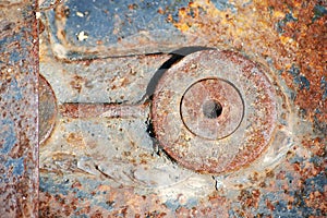 Old metal rusty jack-screw for railway carriage and wheels