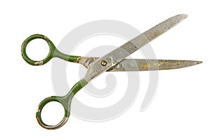 Old metal scissors on white background