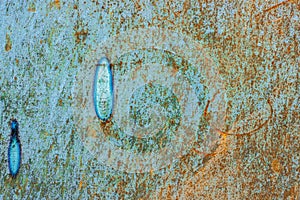 Metal surface with rust and spots, background texture