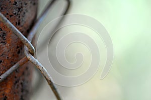 Old metal wire mesh on the black background