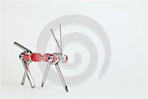 Old metallic red bike multi-tool is going to fix, repair and service on a white background. Animal robot for bike help