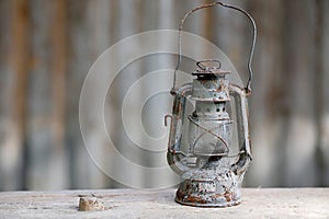 Old metallic rusty kerosene lamp