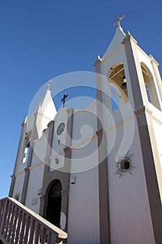 Old Mexican Church against the bright blue sky, Puerto Penasco, Mexico photo