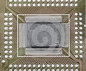 Old microcircuit on circuit board surface