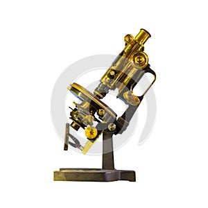 old microscope from close up isolated on white background