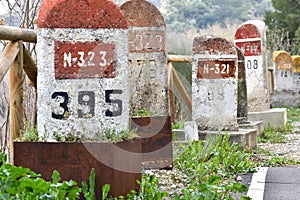 Old milestones exposed on the Bailen-Motril road N-323 as it passes through La Cerradura de Pegalajar