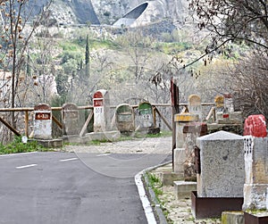 Old milestones exposed on the Bailen-Motril road N-323 as it passes through La Cerradura de Pegalajar photo