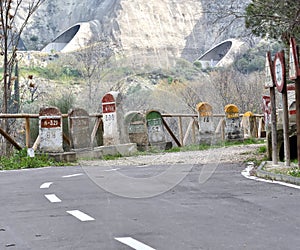 Old milestones exposed on the Bailen-Motril road N-323 as it passes through La Cerradura de Pegalajar photo