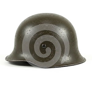 An old military helmet isolated on white photo