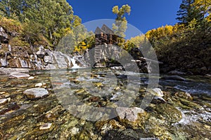Old Mill is an 1892 wooden powerhouse located on an outcrop above the Crystal River in Crystal, Colorado, United States