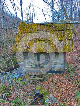 Old mill. Abandoned building. Wooden mill. Landskape photo