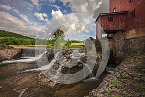 Old Mill along river and waterfall