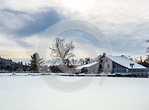 Old Mill at the dam in winter