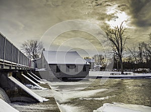 Old Mill at the dam in winter