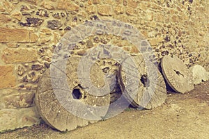 Old millstones with a vintage effect