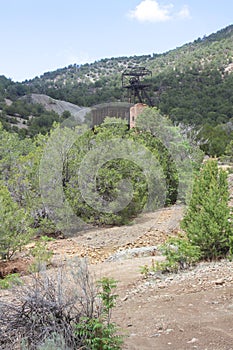 Old mine headframe among the trees