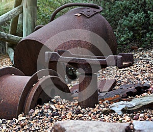 Old mining buckets in gravel