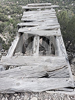 Old mining shaft on mountain top in low saturation