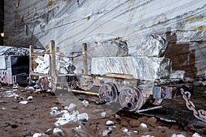 Old mining wagons inside the public Salt Mine at Slanic Prahova, Romania salt mine equipment inside the Slanic Prahova Salt mine