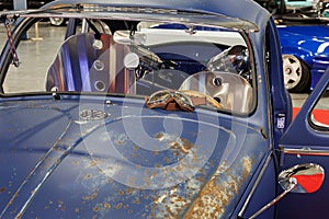 Old Model Volkswagen Beetle with Rusty Exterior Bodywork but Refurbished Internally
