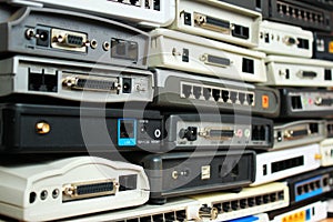 Old modems, routers, network equipment. Serial, phone, audio, et photo