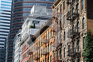 Old and Modern Colorful Buildings and Skyscrapers in the Midtown Manhattan area of New York City with Fire Escapes
