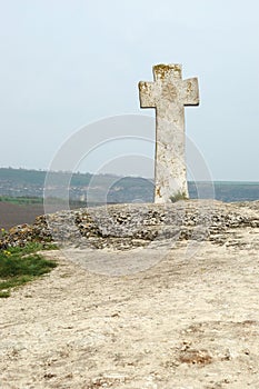 Old moldavian orthodox cross in Orhei, Moldova photo