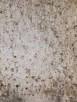 Old moldy with small holes in the stone. Grunge background photo