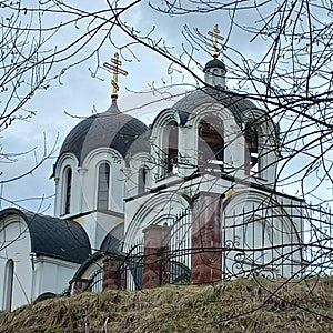 Old monastery church standing in the forest