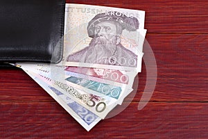Old money from Sweden in the black wallet