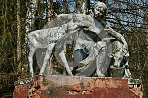 The old monument of the Soviet era the woman-the milkmaid in the Kaluga region (Russia).