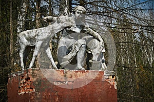 The old monument of the Soviet era the woman-the milkmaid in the Kaluga region (Russia).