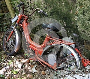 Old moped inoperative abandoned photo