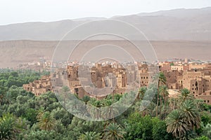 Old Moroccan Kasbah among palmtrees