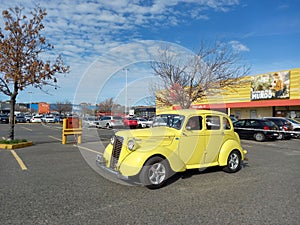 Old Morris Ten Series M four door saloon 1938 - 1948 hot rod at a classic car show in parking lot.