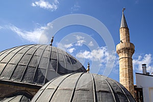 An old mosque domes and minaret